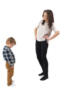 Woman disciplining her step-child.